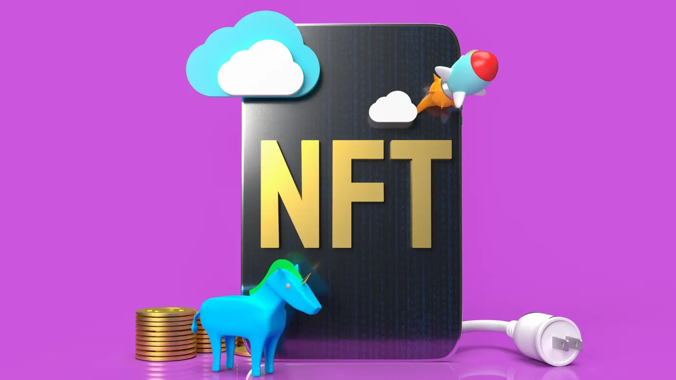 A 3D illustration of the letters NFT in gold on a dark slab, surrounded by a toy unicorn, a stack of gold coins, a rocket and an unplugged cable on a magenta ground