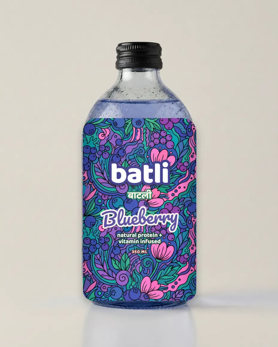 The blueberry bottle shot straight on, cap and glass identical to every other flavour
